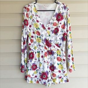 Long sleeved, floral romper. Great condition.